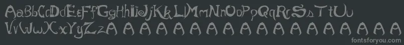 MOREVIL-fontti – harmaat kirjasimet mustalla taustalla