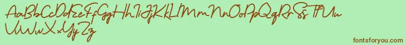 Morning Gold Free-Schriftart – Braune Schriften auf grünem Hintergrund