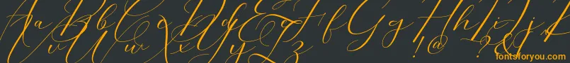Шрифт Morris Script – оранжевые шрифты на чёрном фоне