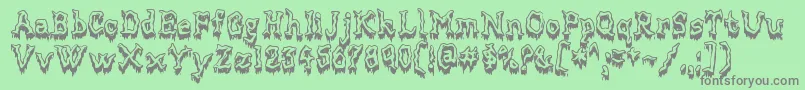 MortifiedDrip-Schriftart – Graue Schriften auf grünem Hintergrund