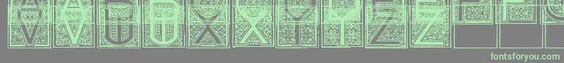 Mosaic i Font – Green Fonts on Gray Background