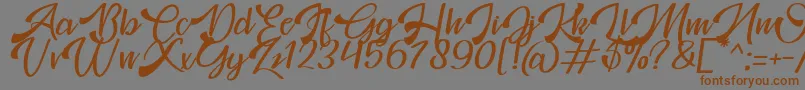 Mosgrade Personal Use Font – Brown Fonts on Gray Background