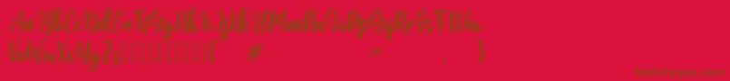 Moshinta Font – Brown Fonts on Red Background