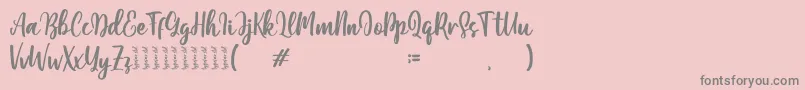 Moshinta Font – Gray Fonts on Pink Background