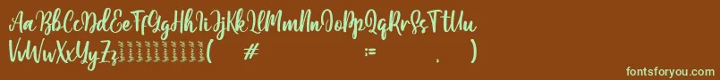 Moshinta Font – Green Fonts on Brown Background