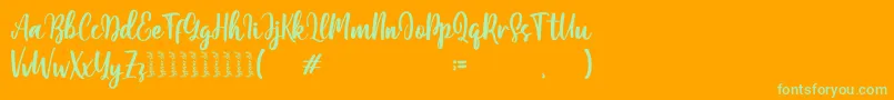 Moshinta Font – Green Fonts on Orange Background