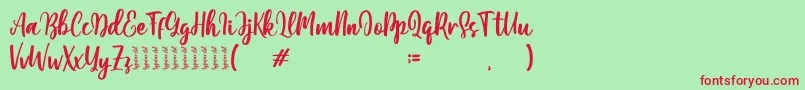 Moshinta Font – Red Fonts on Green Background