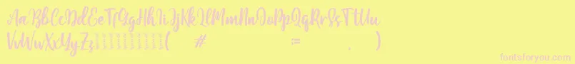 Moshinta Font – Pink Fonts on Yellow Background