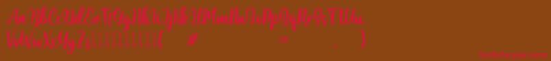 Moshinta Font – Red Fonts on Brown Background