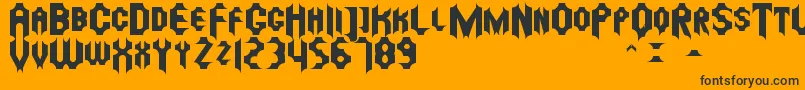 Czcionka Mostera St – czarne czcionki na pomarańczowym tle