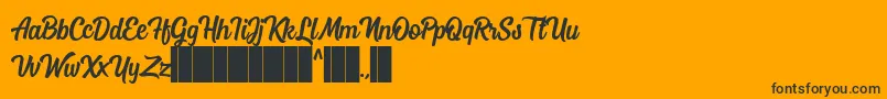 Mostley Script-Schriftart – Schwarze Schriften auf orangefarbenem Hintergrund