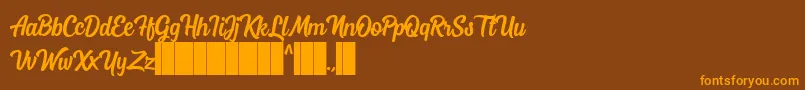 Mostley Script Font – Orange Fonts on Brown Background