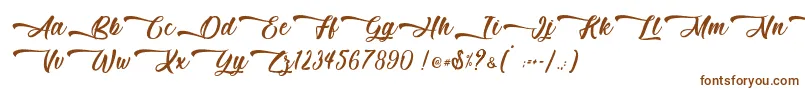 Mother Batik   Personal Use-Schriftart – Braune Schriften auf weißem Hintergrund