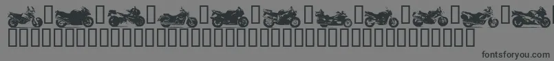 MOTOB   -Schriftart – Schwarze Schriften auf grauem Hintergrund
