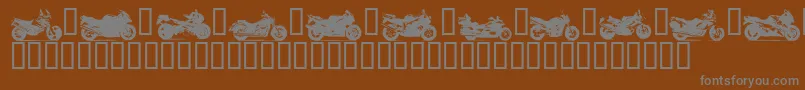 Czcionka MOTOB    – szare czcionki na brązowym tle