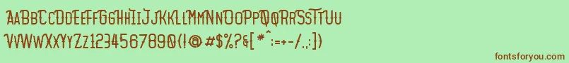 Motopica Font – Brown Fonts on Green Background