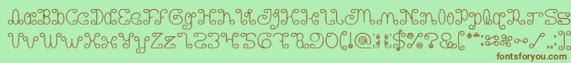 Motorcycle Hollow-fontti – ruskeat fontit vihreällä taustalla