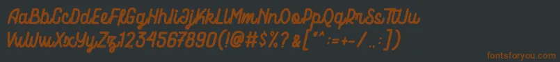 Шрифт Motowerks Demo – коричневые шрифты на чёрном фоне