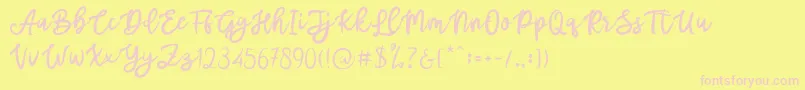 Czcionka Mottas – różowe czcionki na żółtym tle