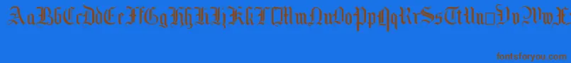 MottisfontNo2-Schriftart – Braune Schriften auf blauem Hintergrund