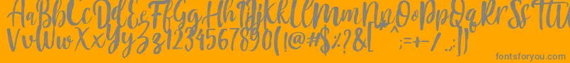 Mountain Script   Brush Font Font – Gray Fonts on Orange Background