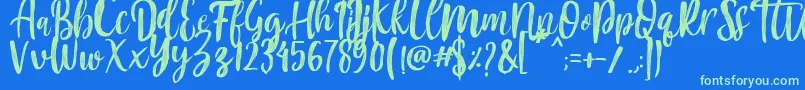 Czcionka Mountain Script   Brush Font – zielone czcionki na niebieskim tle