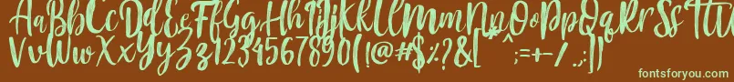 Czcionka Mountain Script   Brush Font – zielone czcionki na brązowym tle