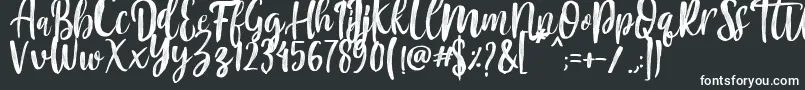 Czcionka Mountain Script   Brush Font – białe czcionki na czarnym tle