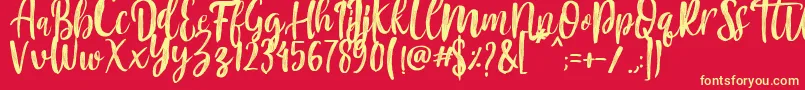 Czcionka Mountain Script   Brush Font – żółte czcionki na czerwonym tle