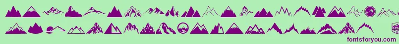Mountain-Schriftart – Violette Schriften auf grünem Hintergrund