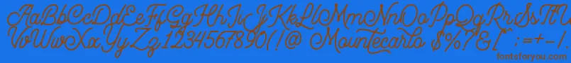 Mountecarlo Font – Brown Fonts on Blue Background