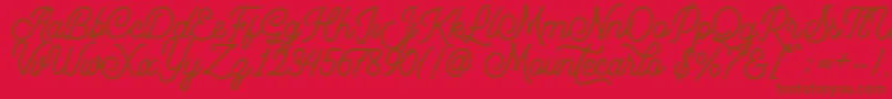 Więcej informacji o czcionce Mountecarlo Czcionka Mountecarlo – brązowe czcionki na czerwonym tle