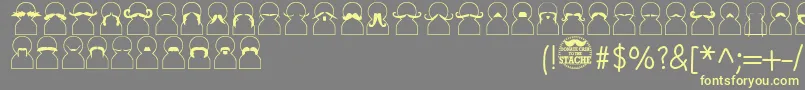 Movember Font – Yellow Fonts on Gray Background