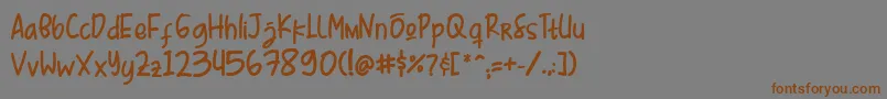Шрифт Mr  Kebab Demo   Script Font – коричневые шрифты на сером фоне