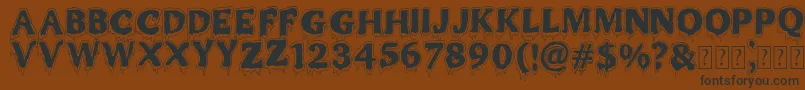 MR MONSTAR-Schriftart – Schwarze Schriften auf braunem Hintergrund