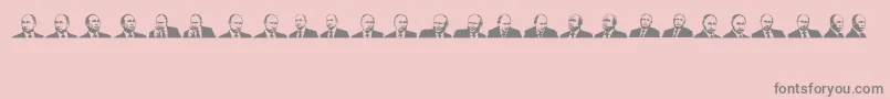 Mr Putin-fontti – harmaat kirjasimet vaaleanpunaisella taustalla