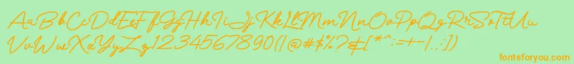 Mranggens-Schriftart – Orangefarbene Schriften auf grünem Hintergrund