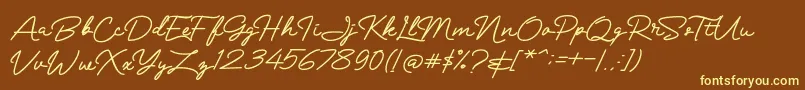 Mranggens Font – Yellow Fonts on Brown Background