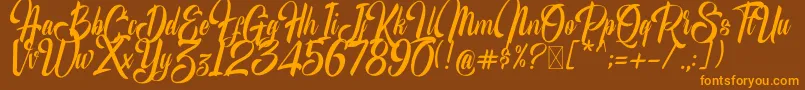 Lisätietoja MrScripton-fontista MrScripton-fontti – oranssit fontit ruskealla taustalla