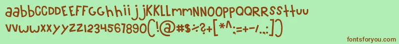 MTF100 Font – Brown Fonts on Green Background