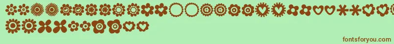 フォントMTF100Dings – 緑の背景に茶色のフォント