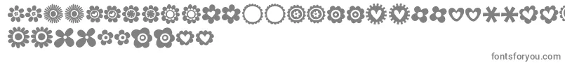 MTF100Dings-fontti – harmaat kirjasimet valkoisella taustalla