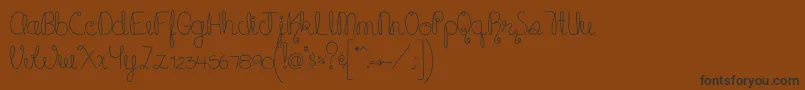 MTFCupcake-Schriftart – Schwarze Schriften auf braunem Hintergrund