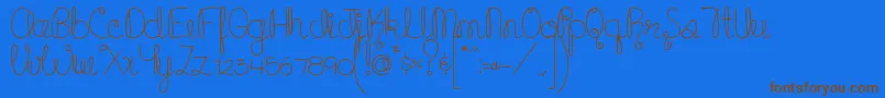 フォントMTFCupcake – 茶色の文字が青い背景にあります。