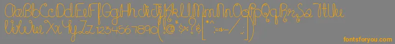 MTFCupcake Font – Orange Fonts on Gray Background
