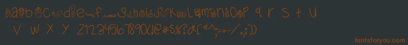 MTFDearSanta Font – Brown Fonts on Black Background