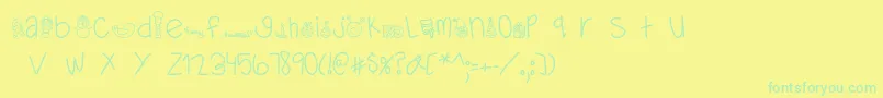 フォントMTFDearSanta – 黄色い背景に緑の文字