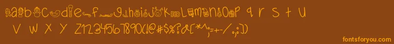 フォントMTFDearSanta – オレンジ色の文字が茶色の背景にあります。