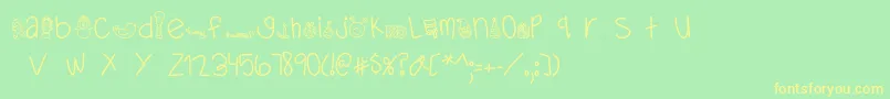 MTFDearSanta-fontti – keltaiset fontit vihreällä taustalla