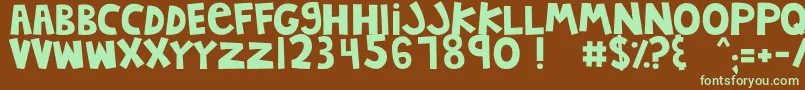 フォントMTFJumpinJack – 緑色の文字が茶色の背景にあります。